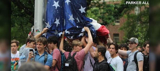 Cover Image for Fraternity Brothers Protect the Flag at UNC Chapel Hill